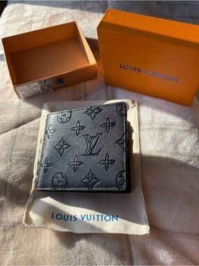 Louis Vuitton Men's Monogram Embossed Black Leather Bifold Wallet